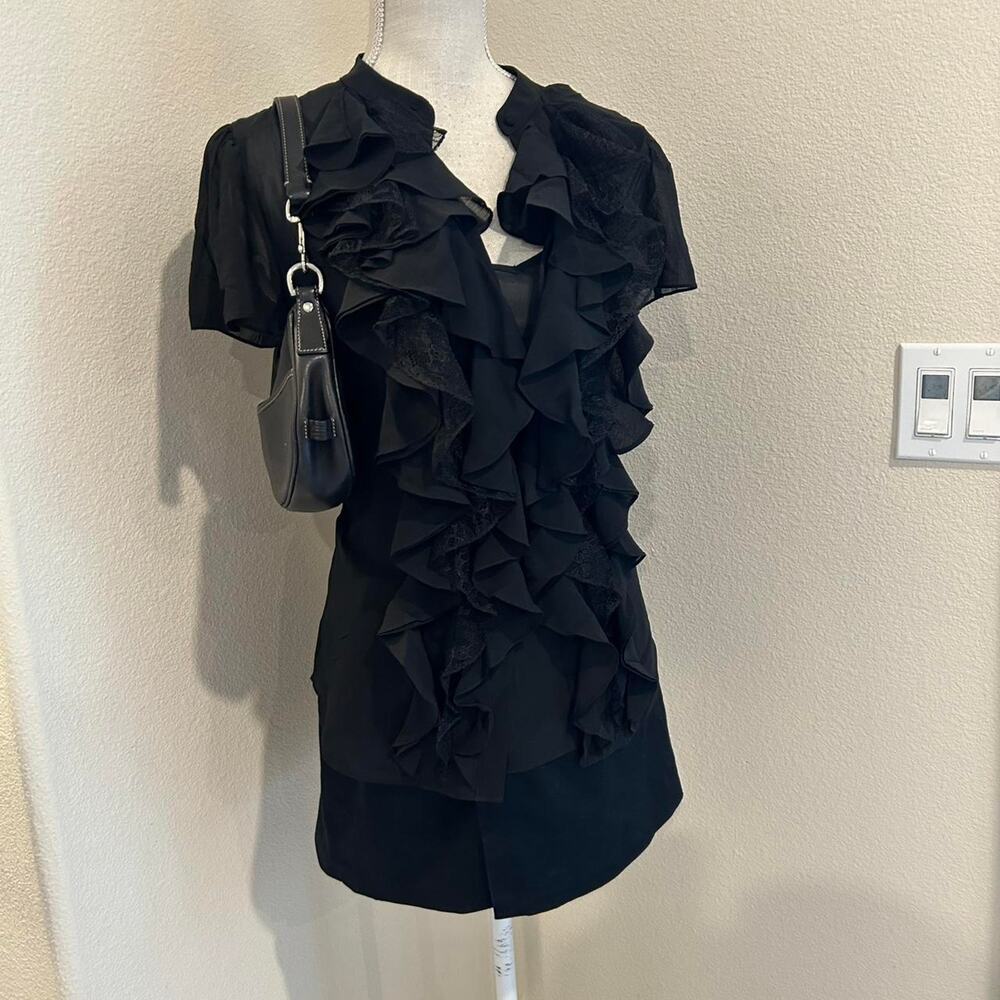 Ralph Lauren black ruffle short sleeve button up blouse. It is sheer. Size 2